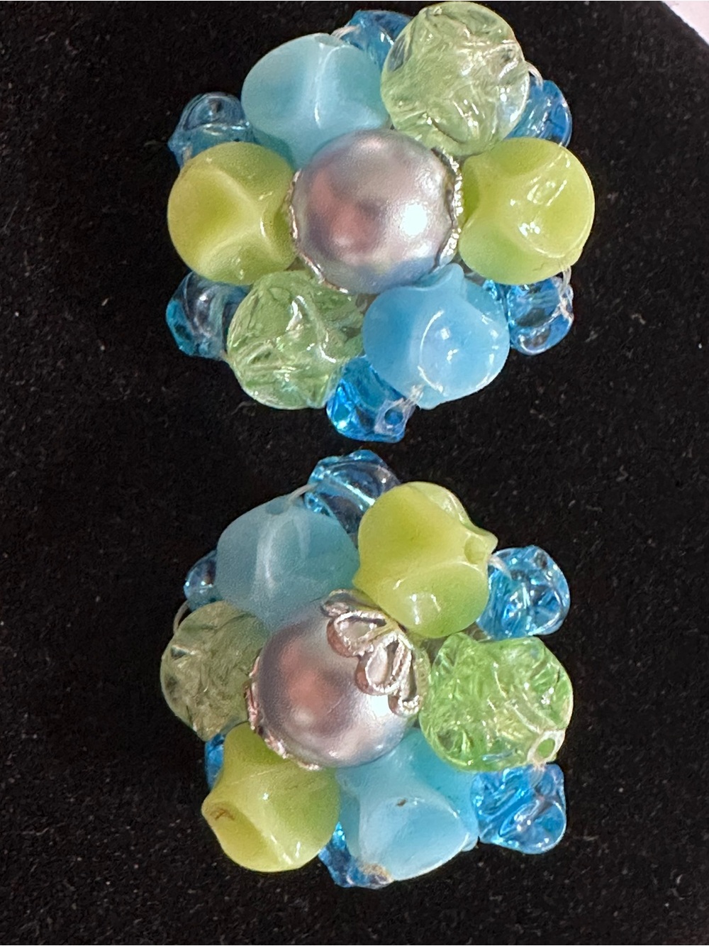 E38- Vtge. Germany clip-on earrings feature a cluster design.